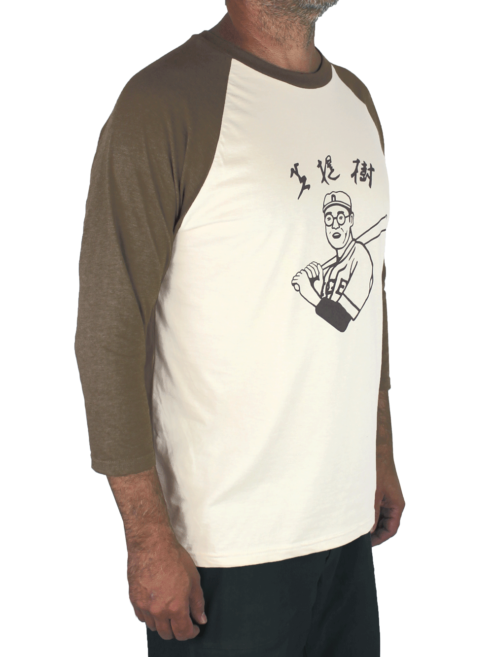 Kaoru Betto baseball shirt with olive heather raglan sleeves, a beige body, and a black screenprint of a japanese baseball player, shot at an angle